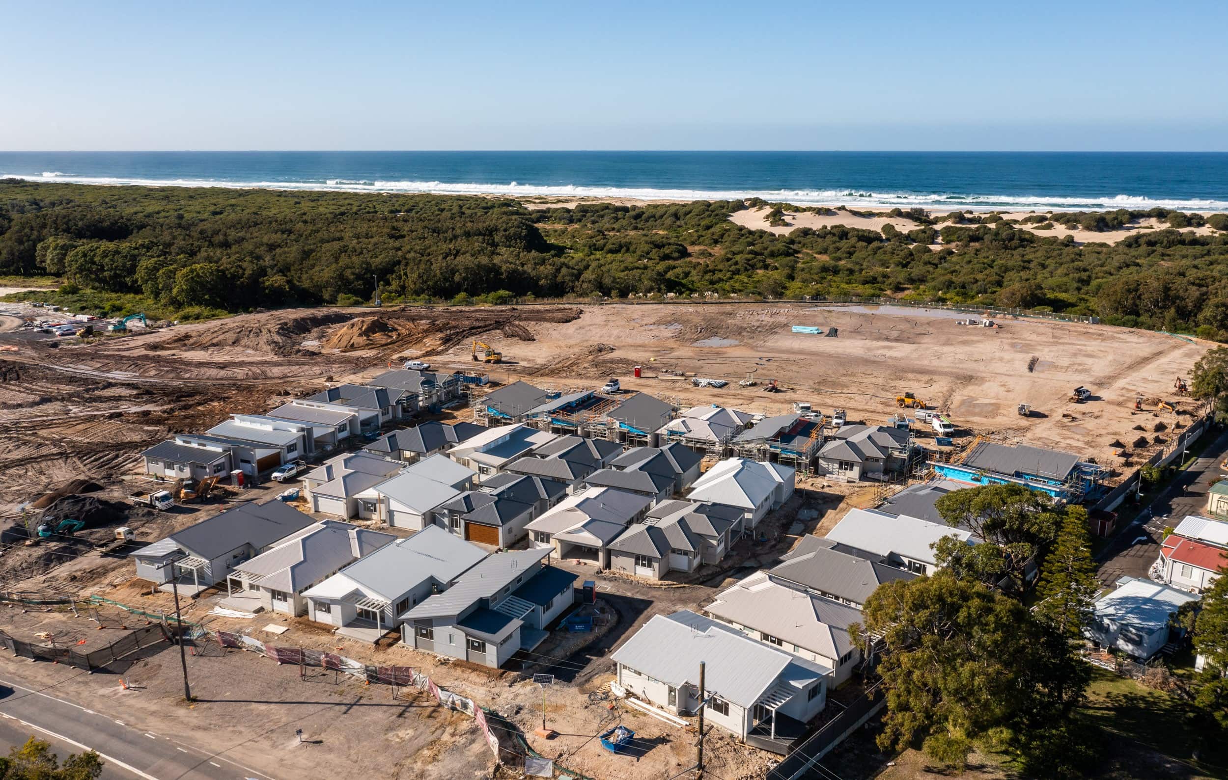 Aerial view of an Oasis Communities site under construction