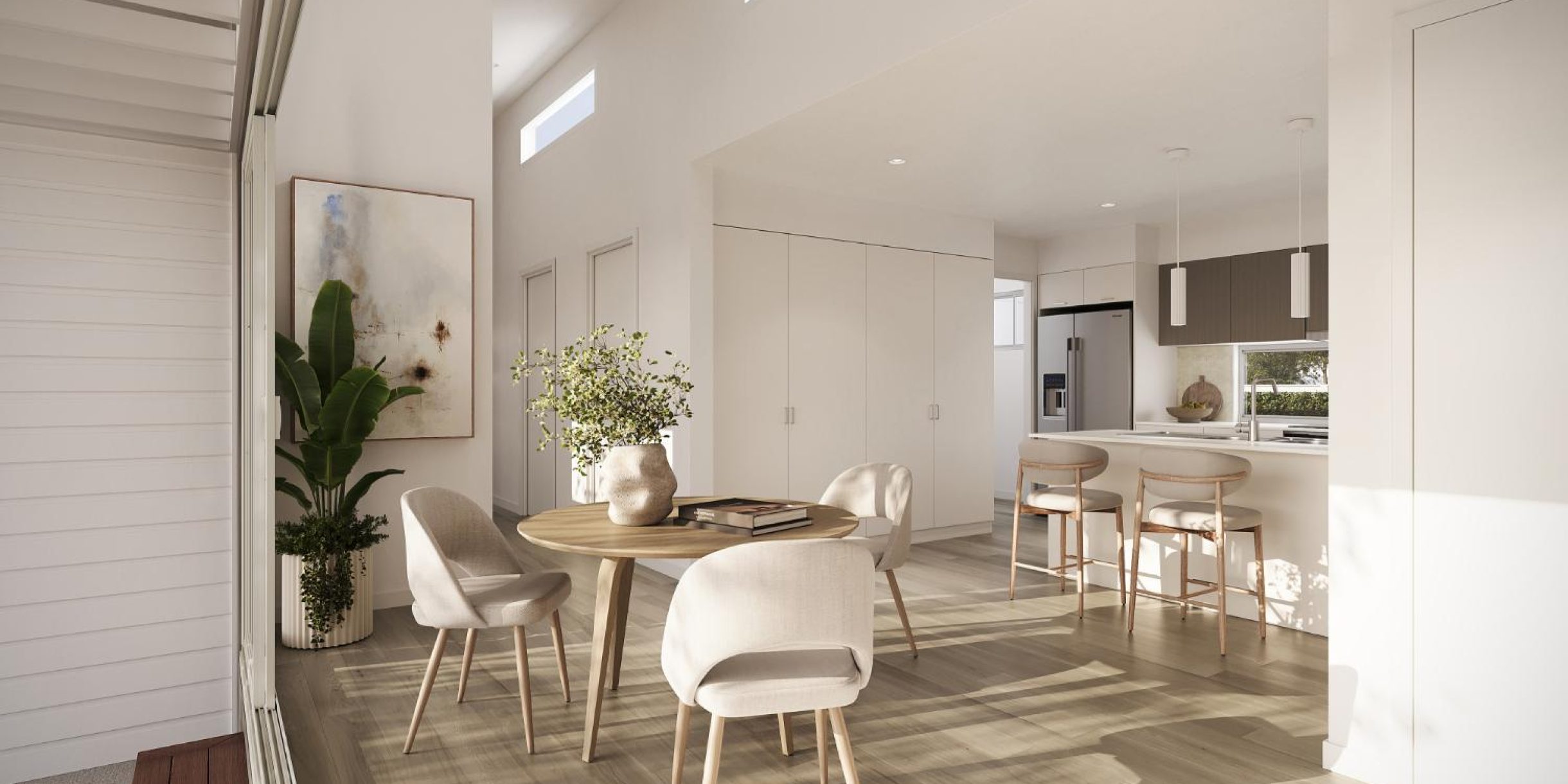 Inside an open plan kitchen, dining space in one of our Oasis Communities homes