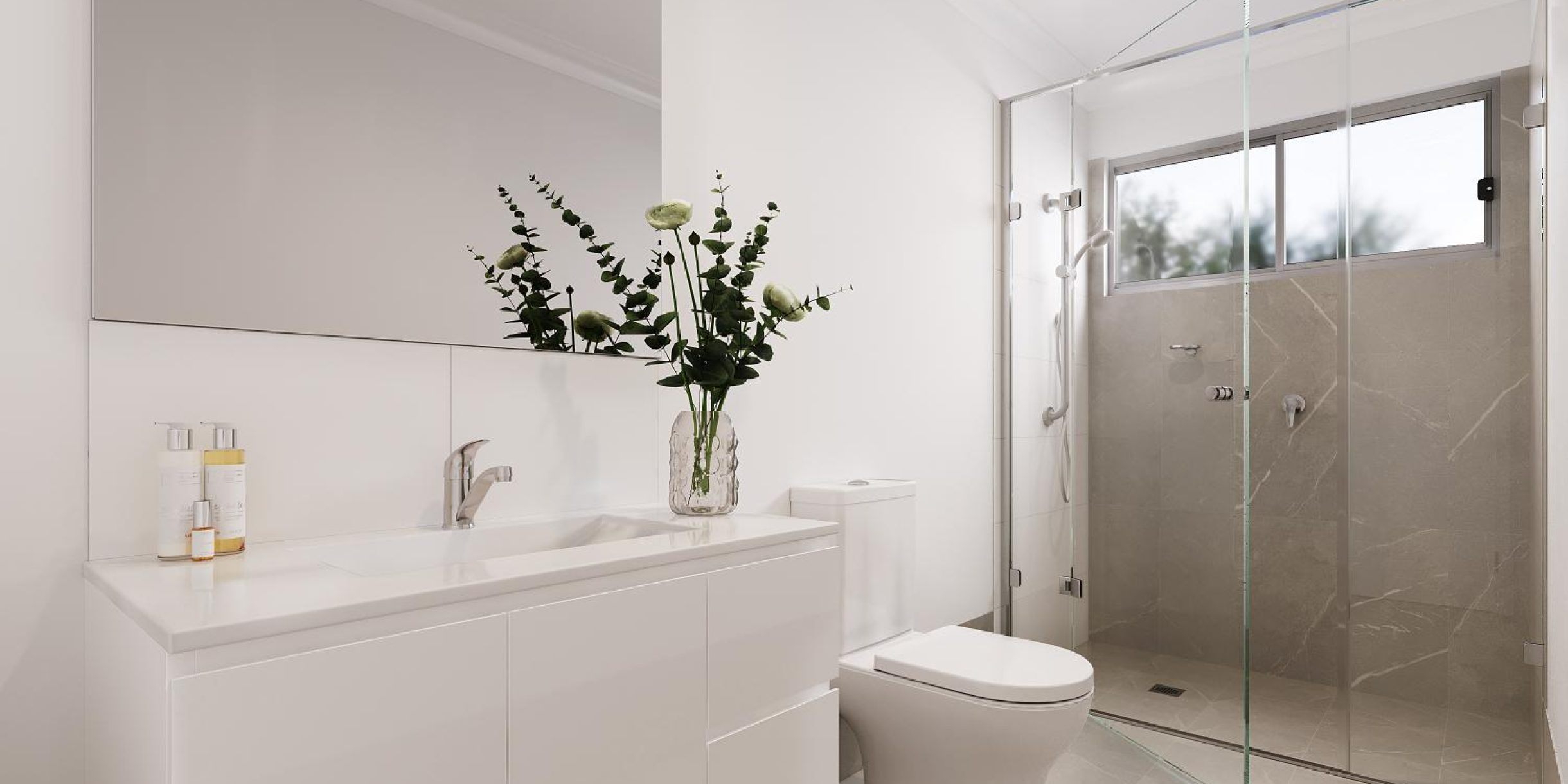 Inside a large modern bathroom in one of our Oasis Communities homes